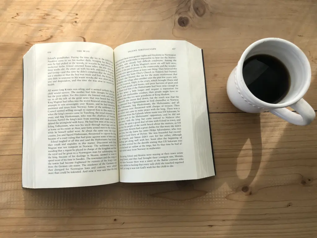 Book reading is often accompanied with a cup of coffee