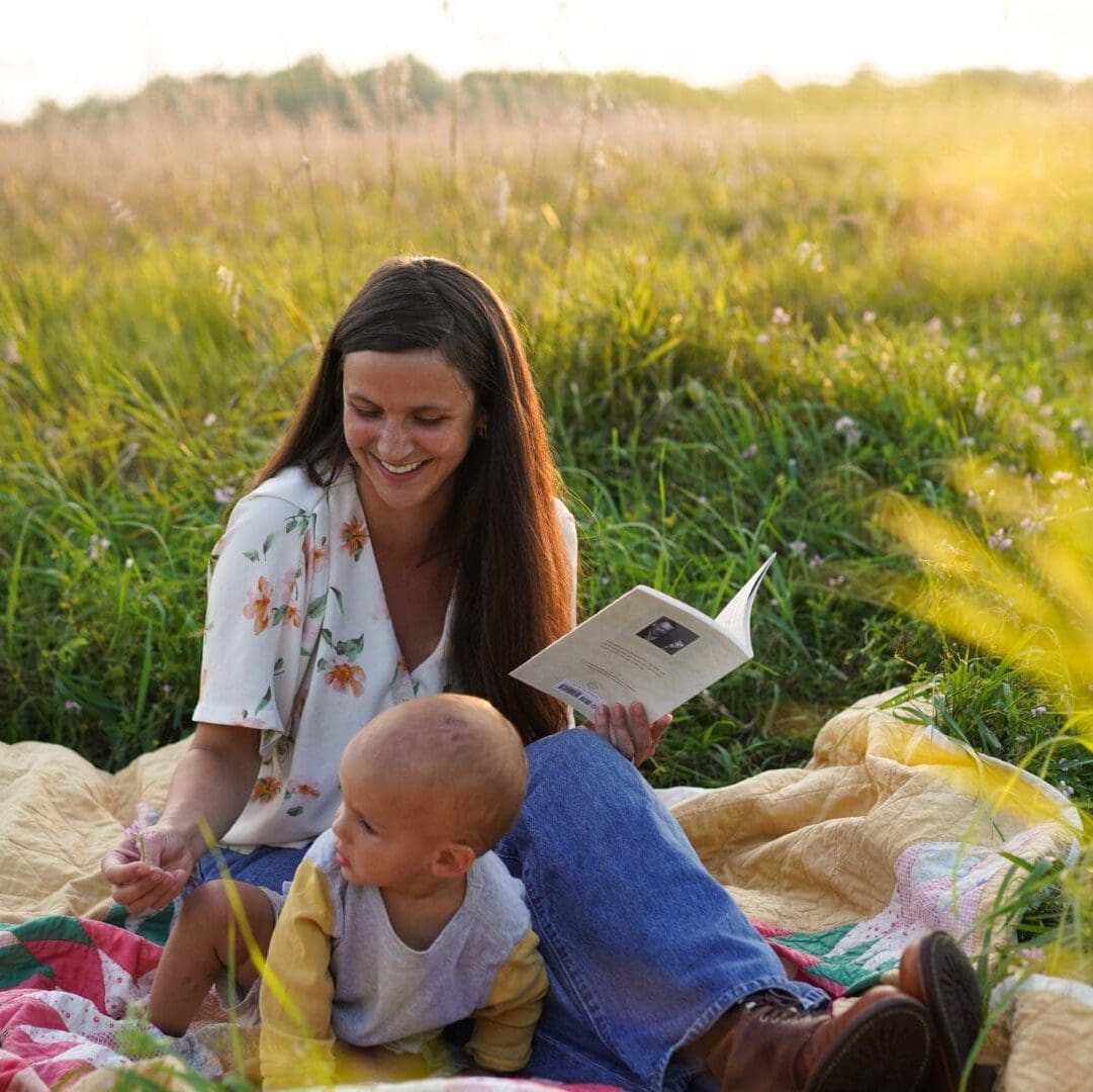 Mother and child enjoying a picnic outdoors.